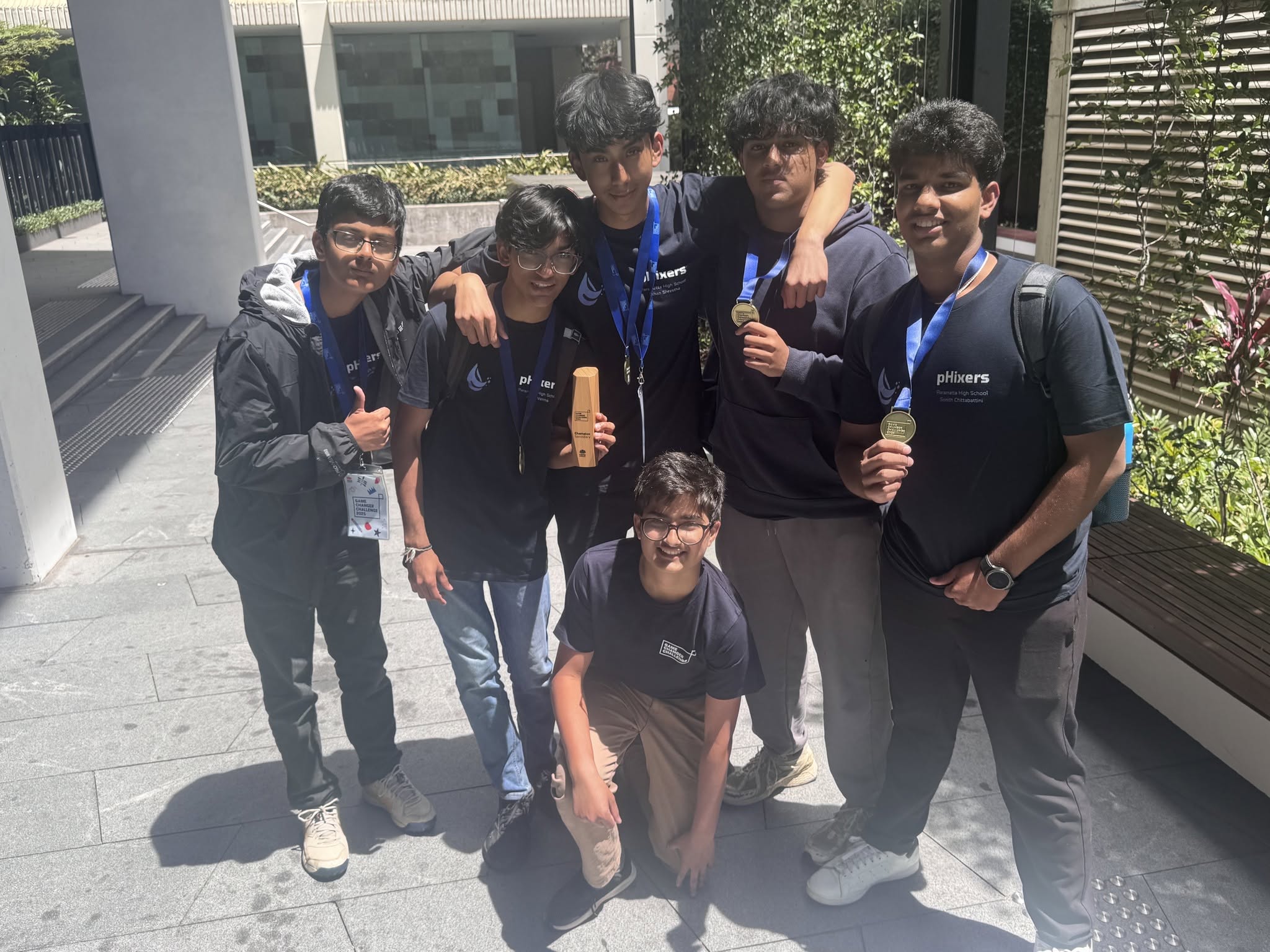 Students celebrating a team achievement together